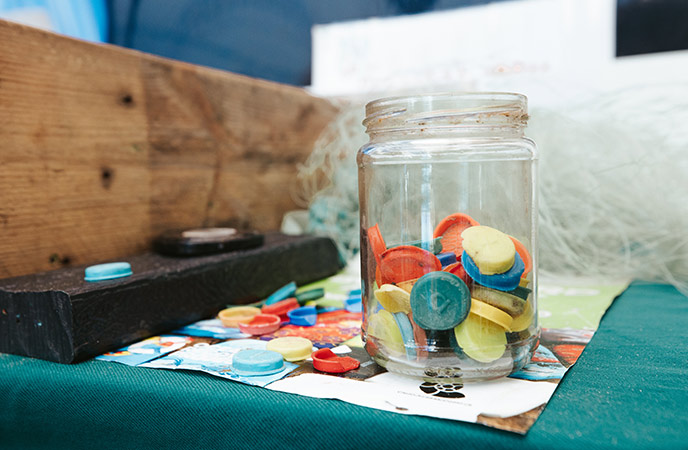 Chesil beach clean bottle tops