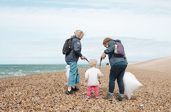 The team beach cleaning