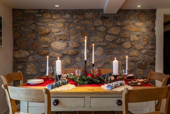 Christmas table set up with crackers