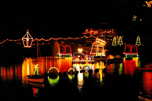 Christmas lights reflecting off the water