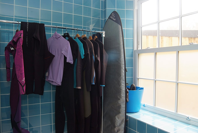 Wetsuit and surfboard rack