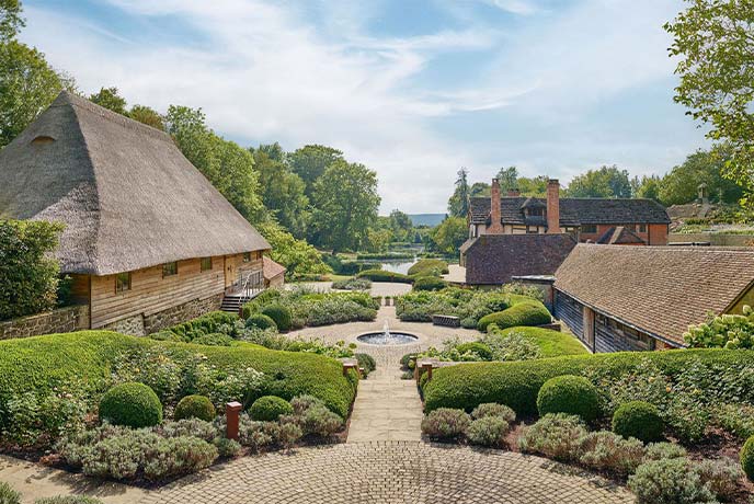The beautiful Nyetimber estate, with thatched roofs and gardens