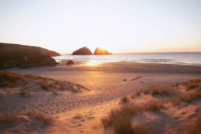 Looking out over Holywell Bay at sun set