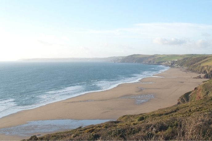 The stretching sand and sea at Whitsand Bay in Cornwall