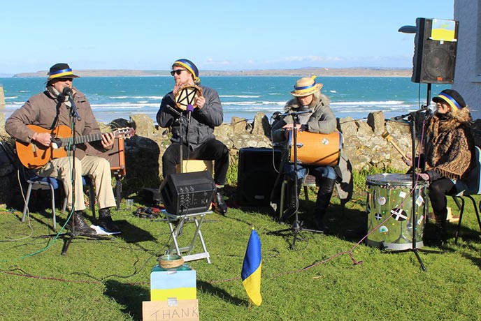 A Band playing in front of the sea at St Ives September Festival