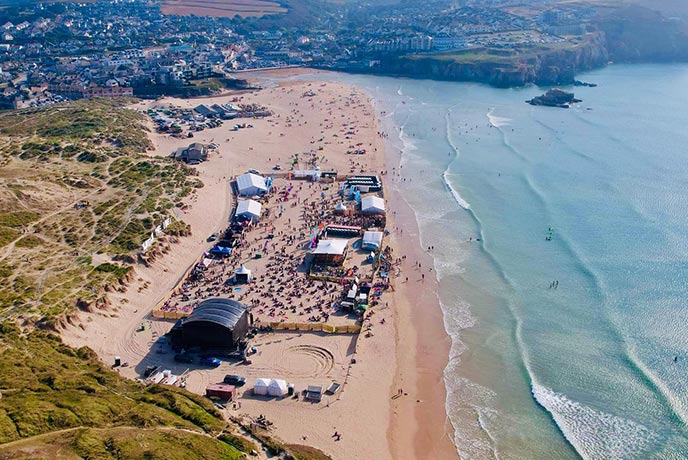 A bird's eye view of the stage and crowds on Perranporth beach for Tunes in the Dunes