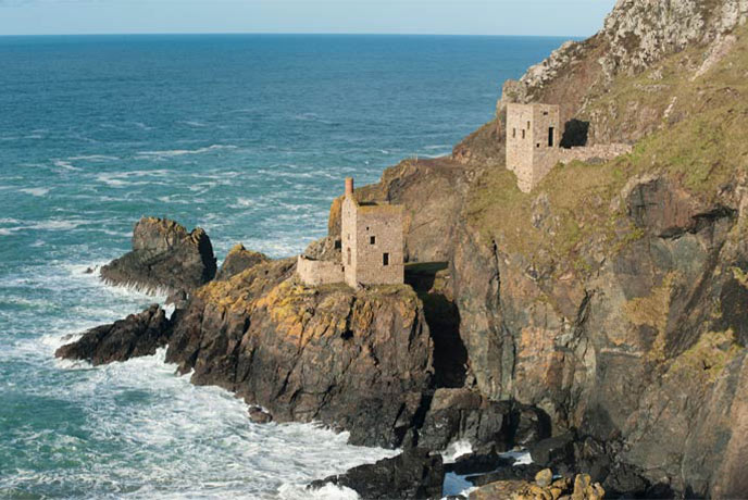 The striking engine houses at Botallack, perched on the cliffs above the sea
