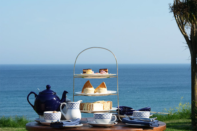 An afternoon tea overlooking the sea at The Nare Hotel on the Roseland Peninsula