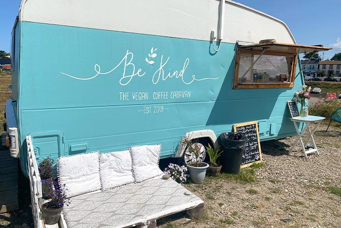 The bright blue vegan coffee caravan, Be Kind in Cornwall