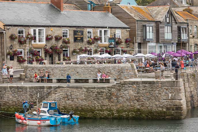 The lovely beer garden at Harbour Inn perched on the edge of Porthleven Harbour