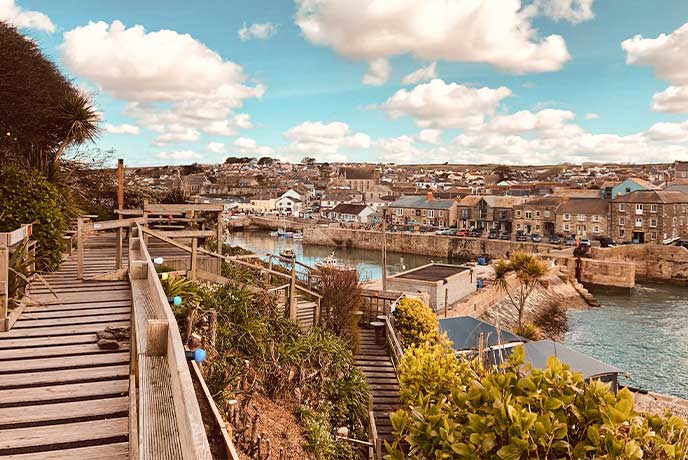 Looking down over the terraced pub garden at The Ship Inn at Porthleven harbour