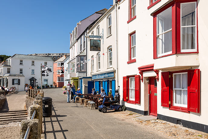 Looking down the colourful street in Kingsand at The Devonport Inn