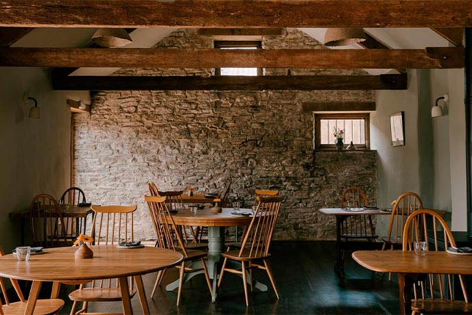 The cosy dining room at Crocadon in Cornwall
