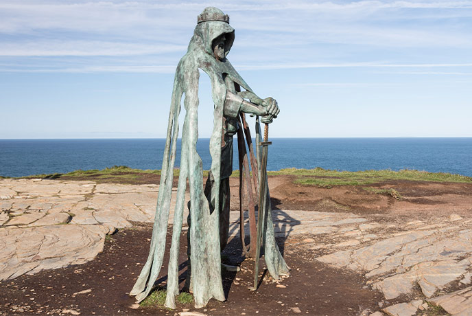 The iconic statue of King Arthur at Tintagel Castle in Cornwall