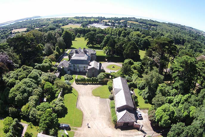 A bird's eye view of the historic Tregrehan Gardens and house in Cornwall