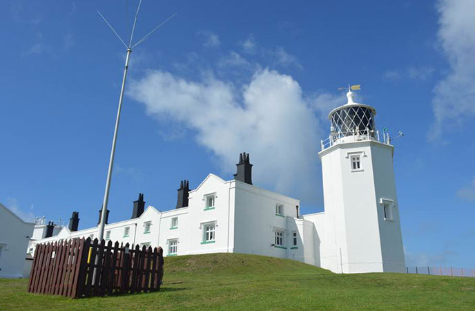 The towering white Lizard Lighthouse