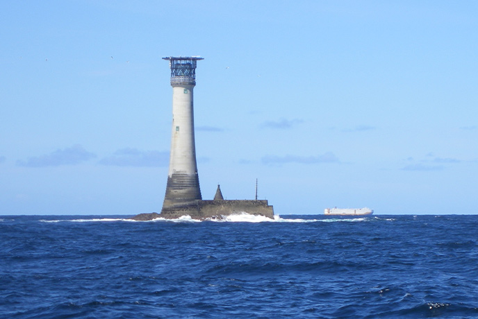 The Wolf Rock Lighthouse, far out to sea off the coast of Cornwall