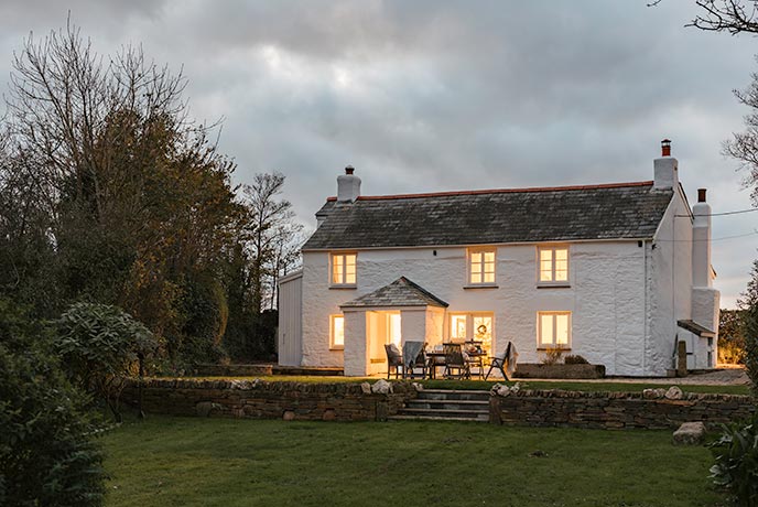 A country cottage at dusk