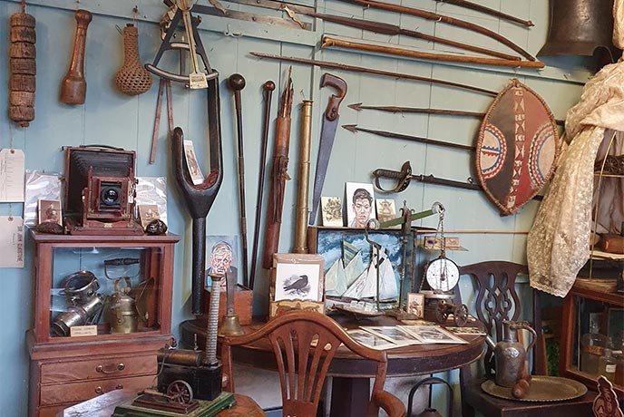 A room full of antiques at Cape Cornwall Arts & Antiques in Cornwall