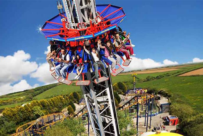 Children on one of the rides at Flambards Theme Park on the Lizard Peninsula