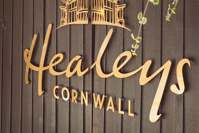 The golden sign at Healeys Cyder Farm in Cornwall