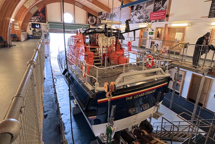 The lifeboat inside the Lizard Lifeboat Station on the Lizard