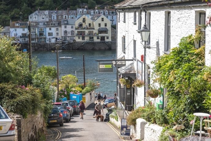 Looking down the hill towards a quaint pub and the estuary in Fowey