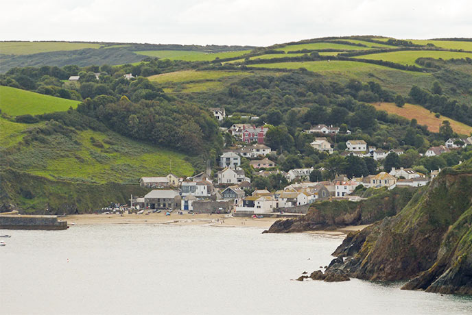 The harbourside village of Gorran Haven nestled in the cliffs on the Roseland Peninsula