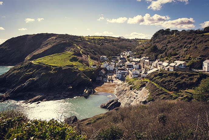 The pretty harbourside village of Portloe nestled into the cliffs on the Roseland Peninsula