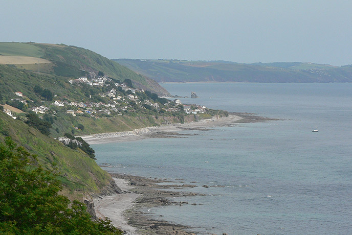 Looking down the South West Coast Path and seaside village of Seaton