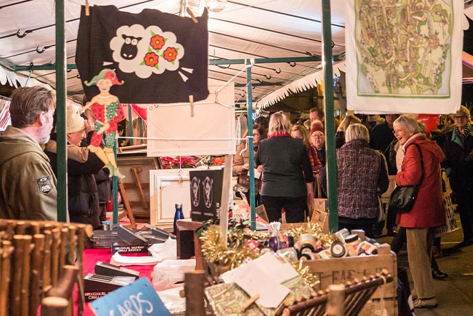 People browsing the stalls at Winchcombe Christmas Festival