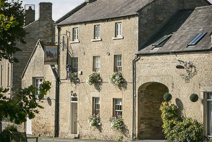 The classic golden hue of Cotswold stone creates a beautiful exterior for The Kingham Plough