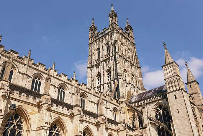 Looking up at the spires of Gloucester Cathedral in the Cotswolds