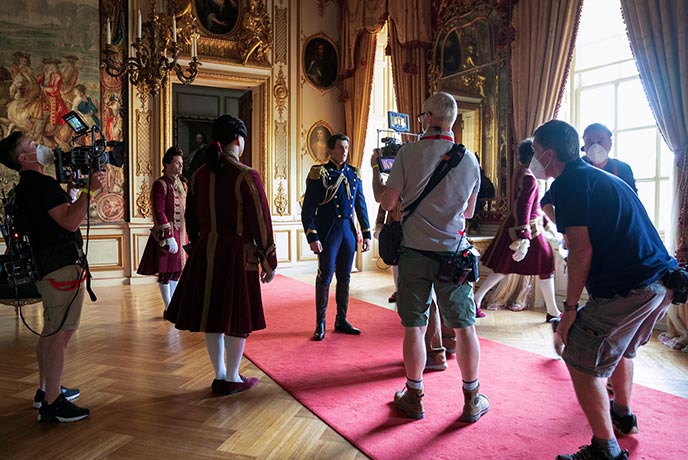 Actors and cameras filming at Blenheim Palace