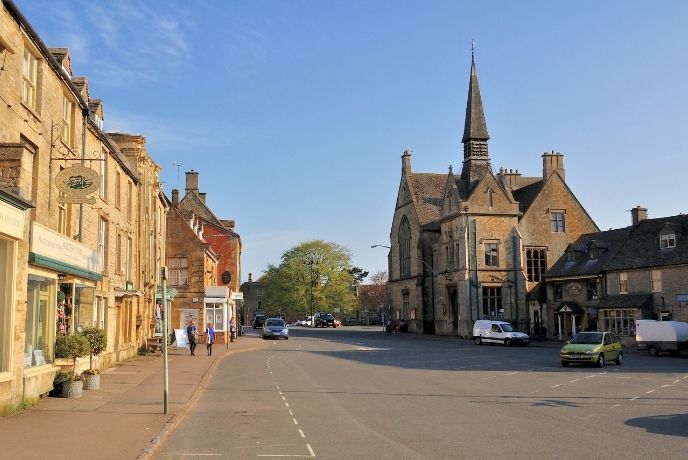 Looking down the honey hued highstreet of Stow-on-the-Wold with the church in the background