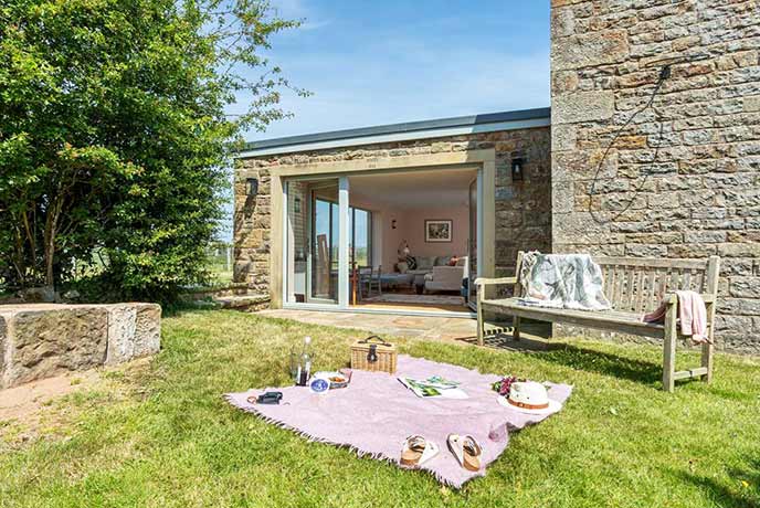 Picnic in the sunshine in a cottage garden