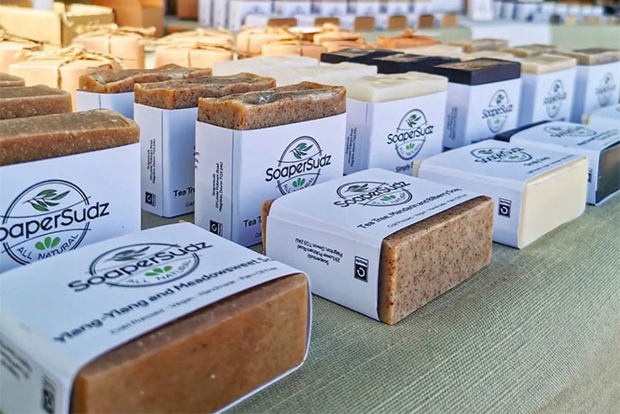 A table full of handmade soap at the Devonmade Christmas Market