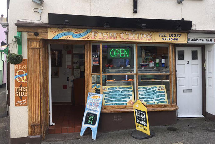 The welcoming shop front of Sylvester's Fish and Chip Shop, one of the best fish and chips in Devon