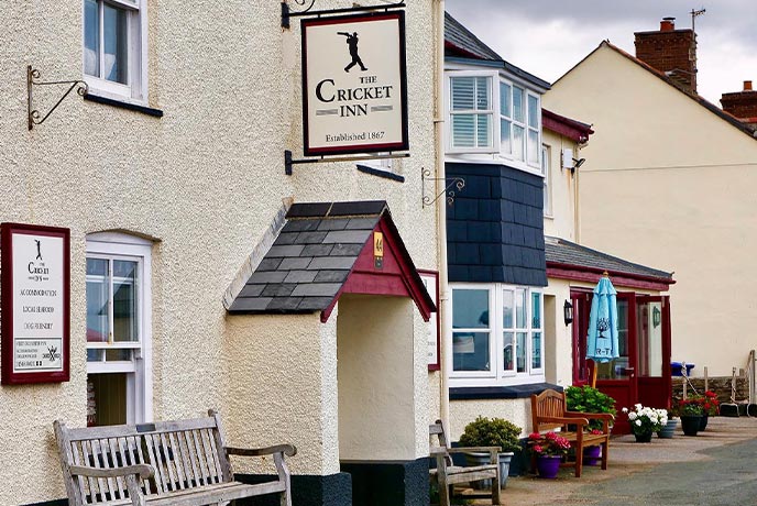 The cream exterior of the dog-friendly Cricket Inn in Beesands