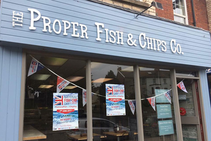 The welcoming exterior of The Proper Fish & Chips Co, one of the best fish and chips in Devon