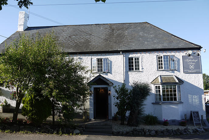 The white exterior of The Tytherleigh Arms