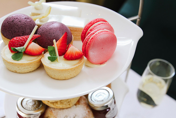 A close up of the delicious afternoon tea at Boringdon Hall in Plymouth, including tarts and macaroons