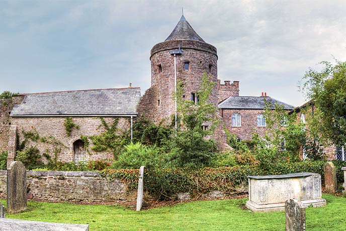 The pink-stoned Tiverton Castle in Devon