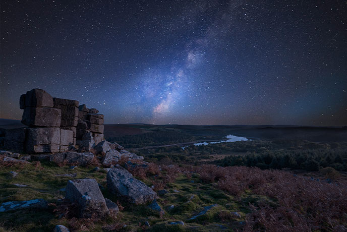 A starry sky above Leather Tor in Dartmoor National Park