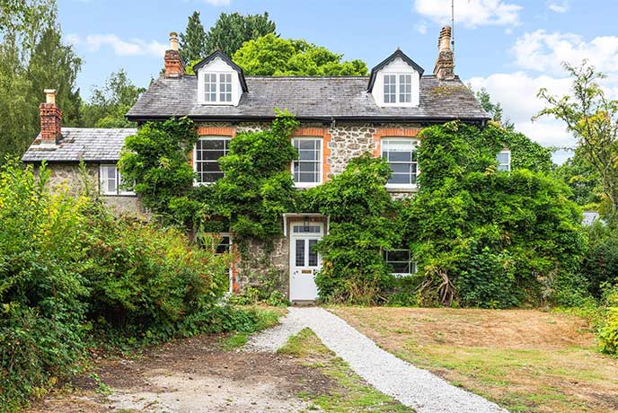 The ivy covered Greystones cottage in Devon