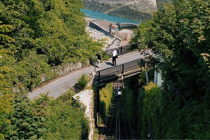 Looking down the steep tracks at a carriage on the Lynton & Lynmouth Cliff Railway