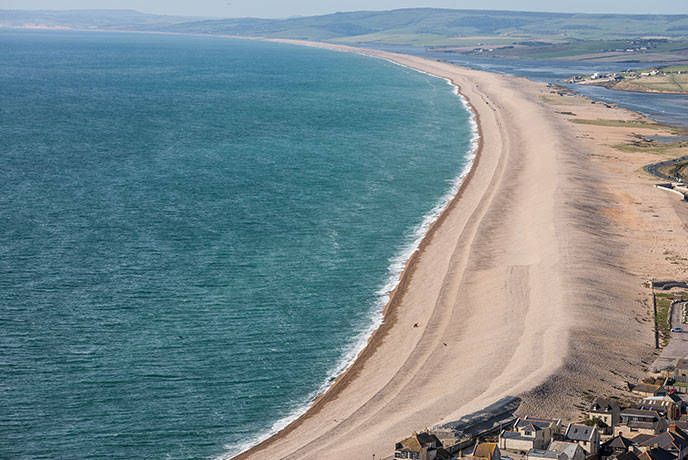 The unfathomably long stretch of sand at Chesil beach in Dorset