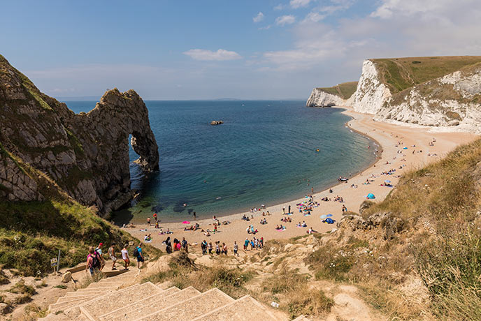The iconic arch and chalk white cliffs at Durdle Door in Dorset
