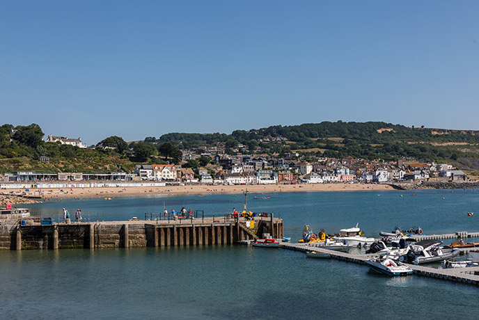 Looking across the pier towards Lyme Regis beach in Dorset