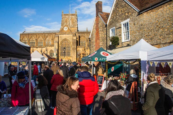 People browsing the many stalls at Sherborne Christmas Market